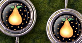 Shadowbox Earrings are handmade with vintage images and clever words magnified under solid glass glass crystal domes.